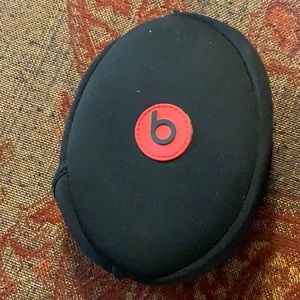 Wired Beats headset. White and red. New condition.